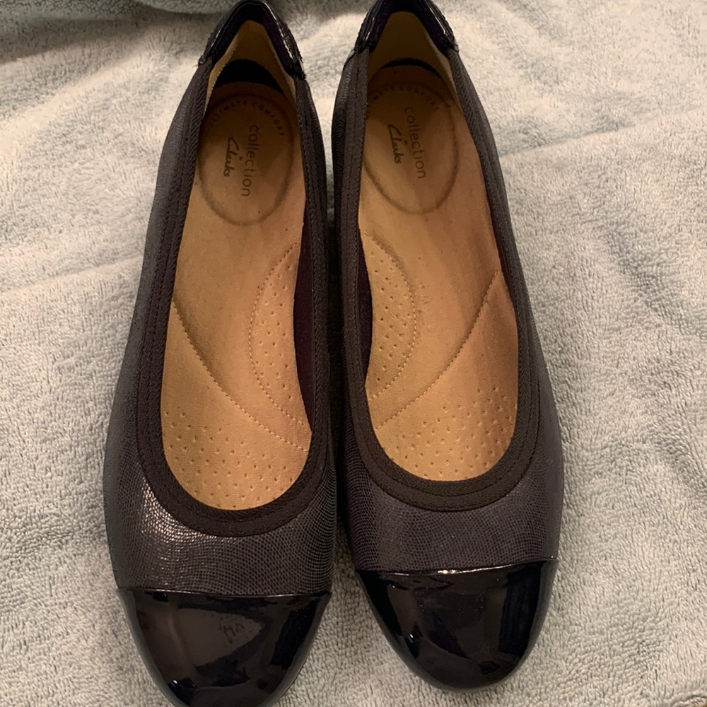 Clark’s navy flats